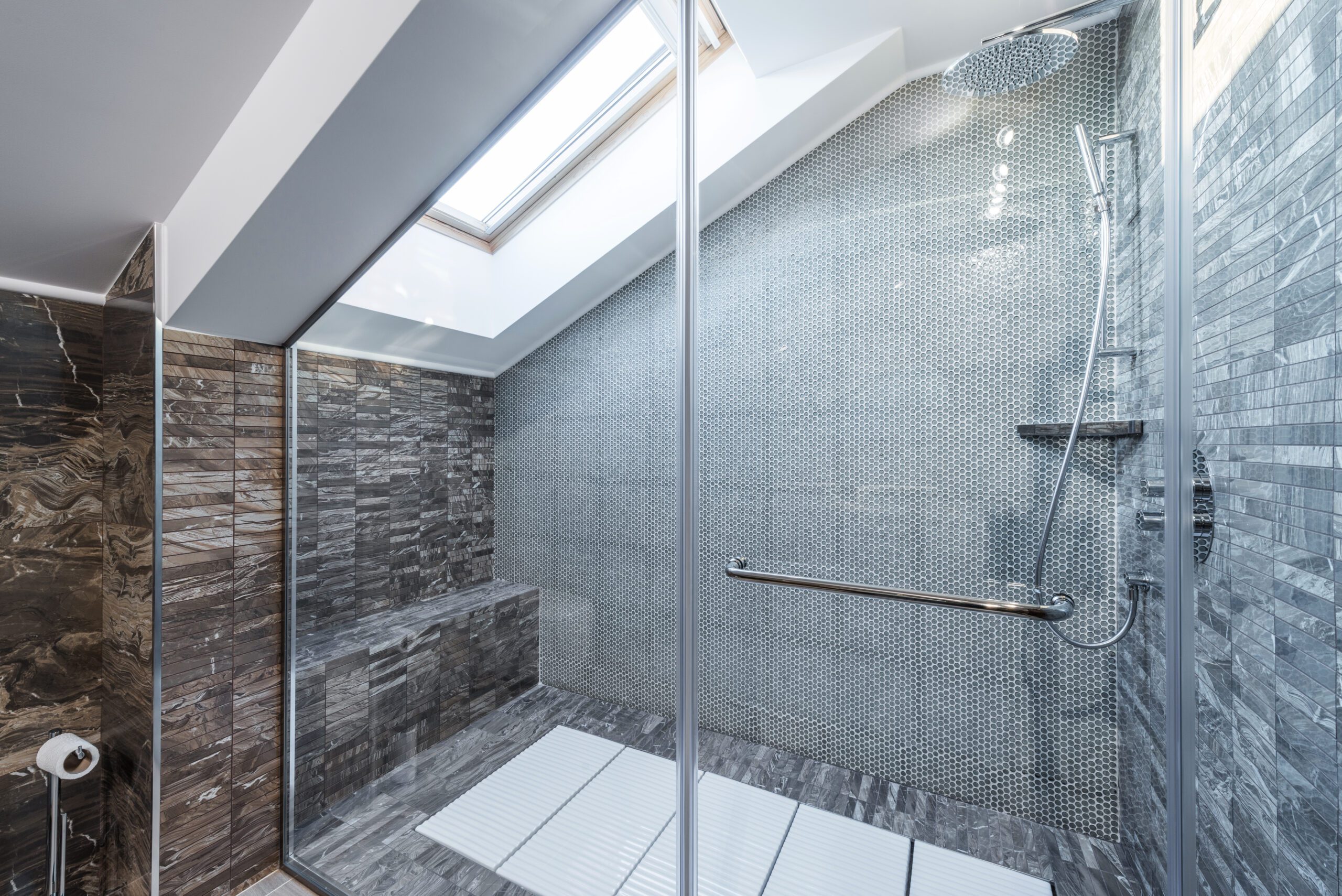 Shower door geometric shape with skylight and tile