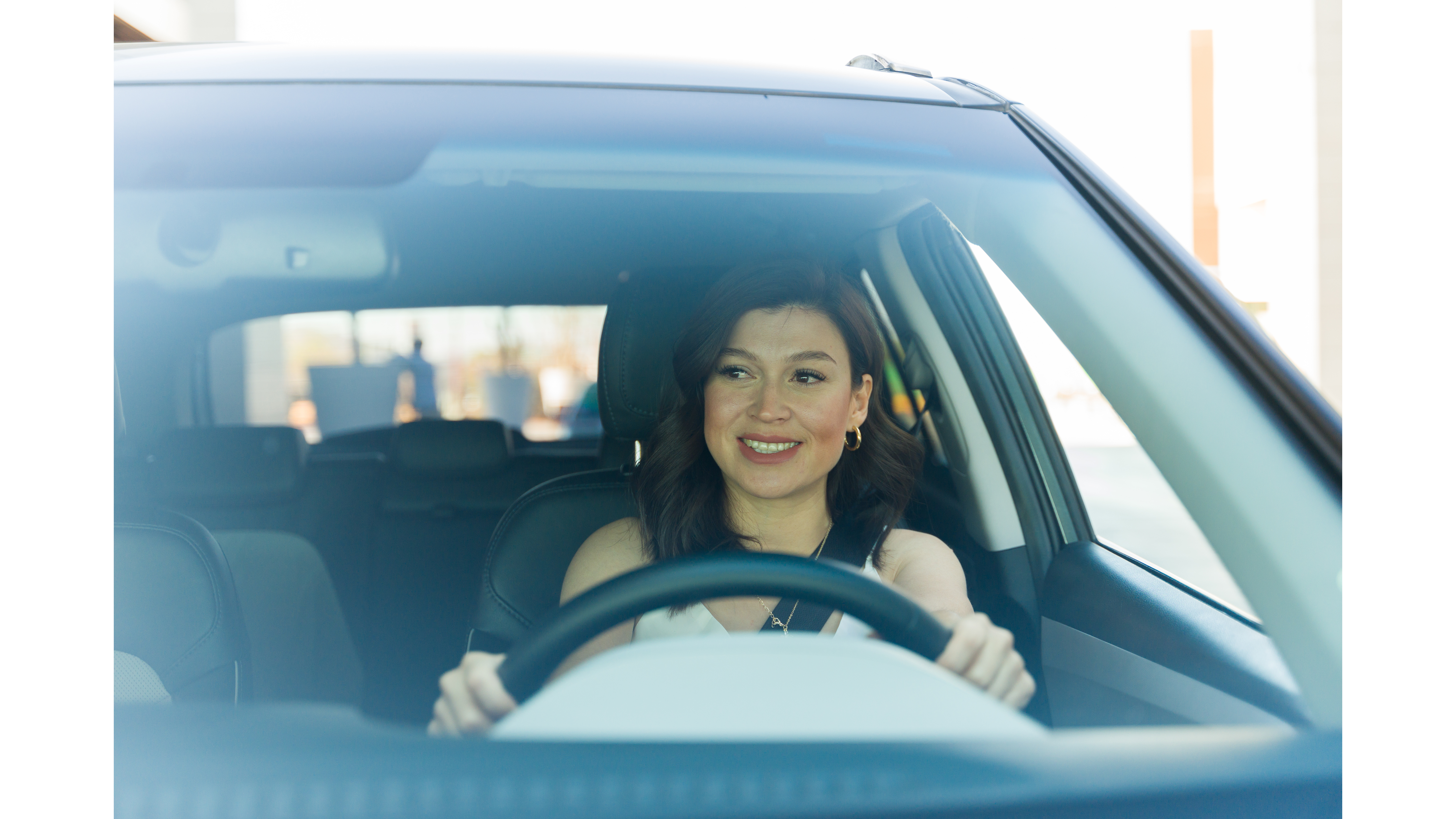 Woman driving with new windshield