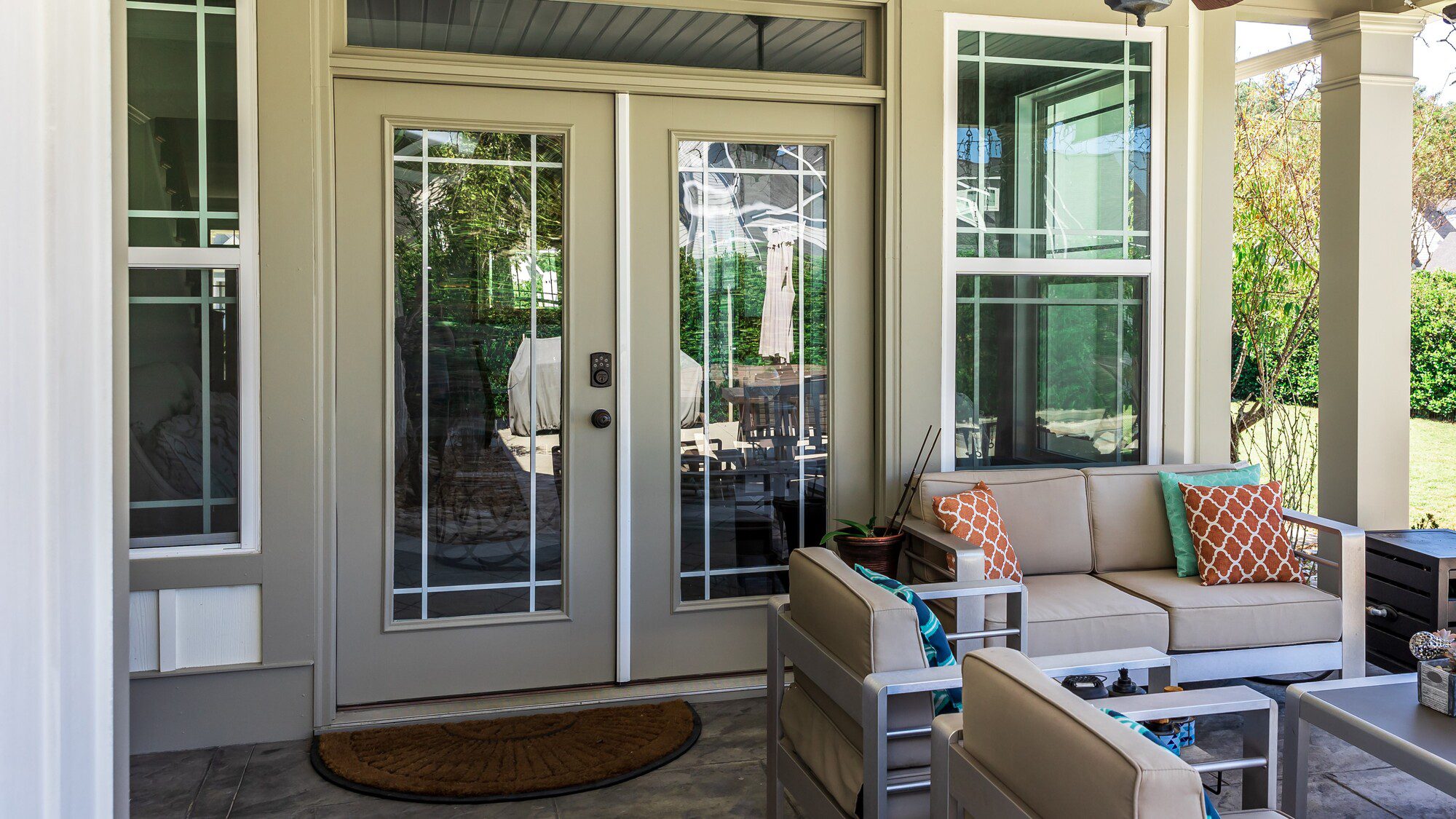 Patio with newly installed replacement doors and beautiful large windows