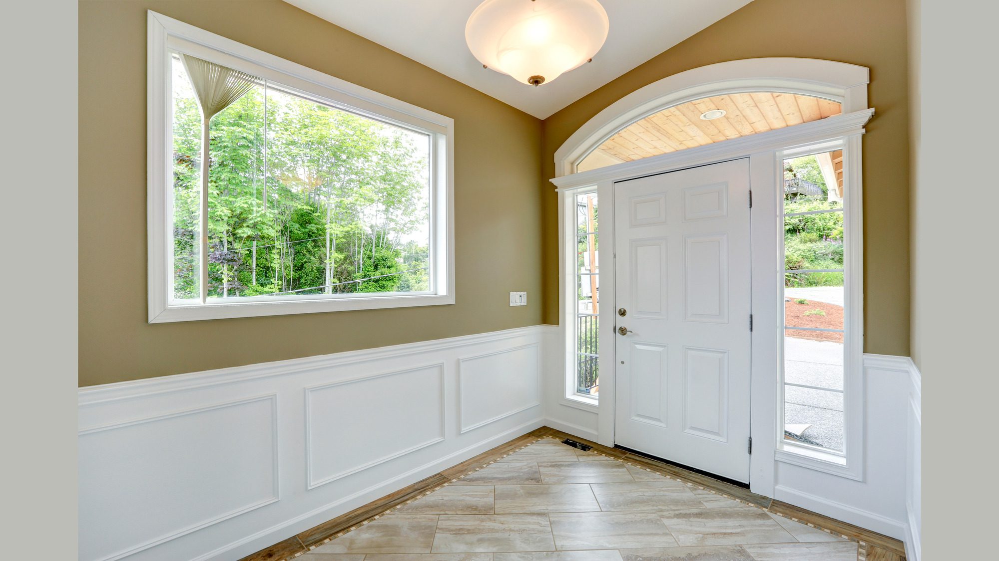 Dining room with large windows and fireplace